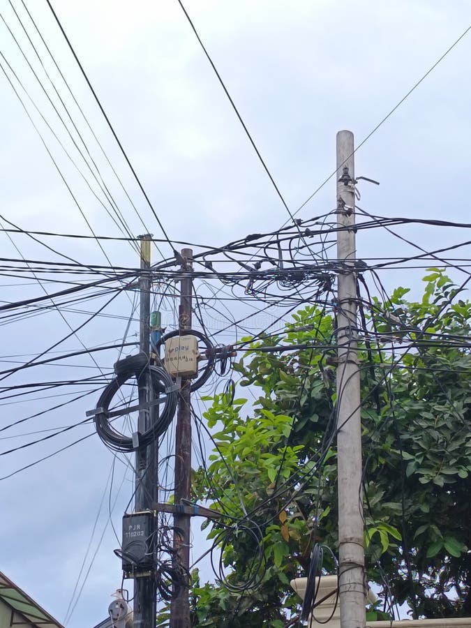 Power poles are one of the main components of the construction of the distribution of overhead lines that support the mains royalty free stock image