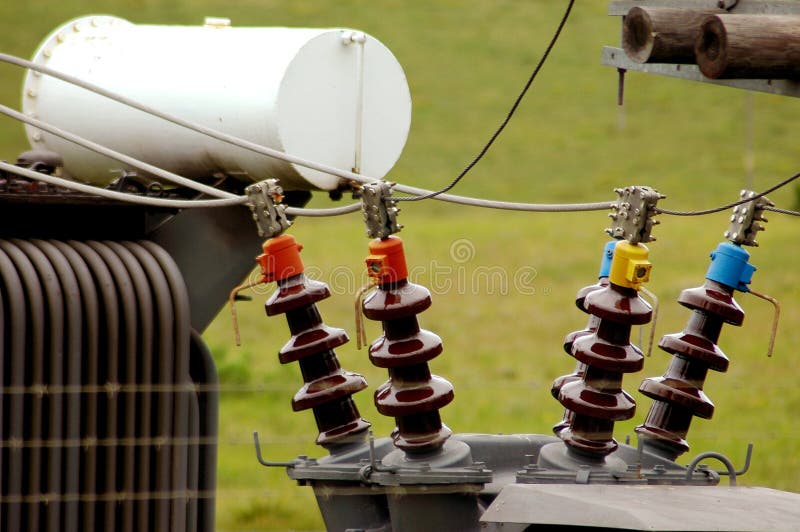 Four colorful pylons as part of a power station in Port Elizabeth, Eastern Cape, South Africa. Red pylons stock images, royalty-free photos and pictures