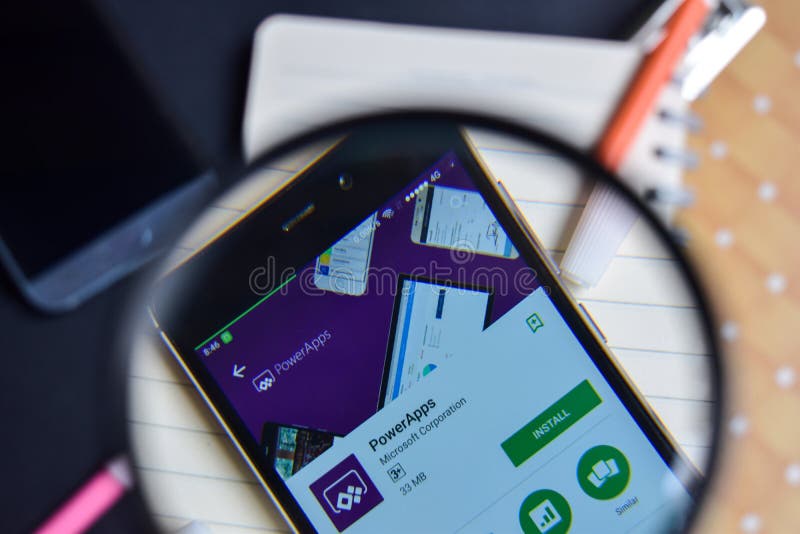 Download PowerApps With Magnifying On Smartphone Screen. Editorial ...