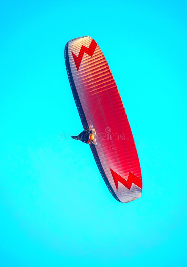 Powered Paraglider Flying in the Blue Sky Stock Photo Image of parachute, pilot 204677486