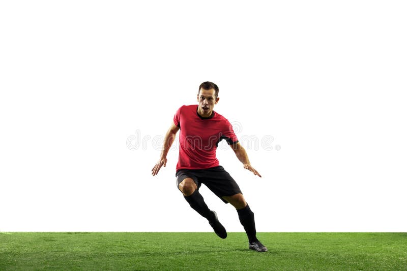 Young football, soccer player of team in action, motion isolated on white background. Concept of sport, movement, energy