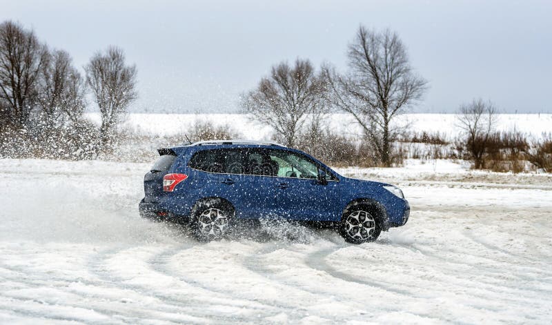 Powerful offroader car sliding by lake ice stock images Powerful offroader car sliding by lake ice stock images