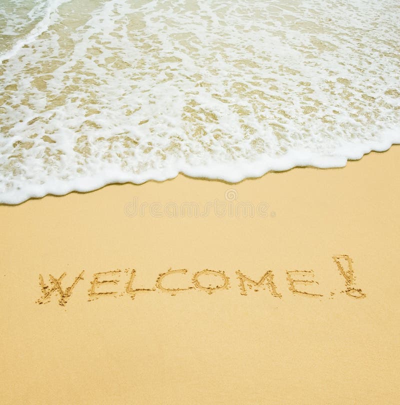 Welcome written in a sandy tropical beach. Welcome written in a sandy tropical beach