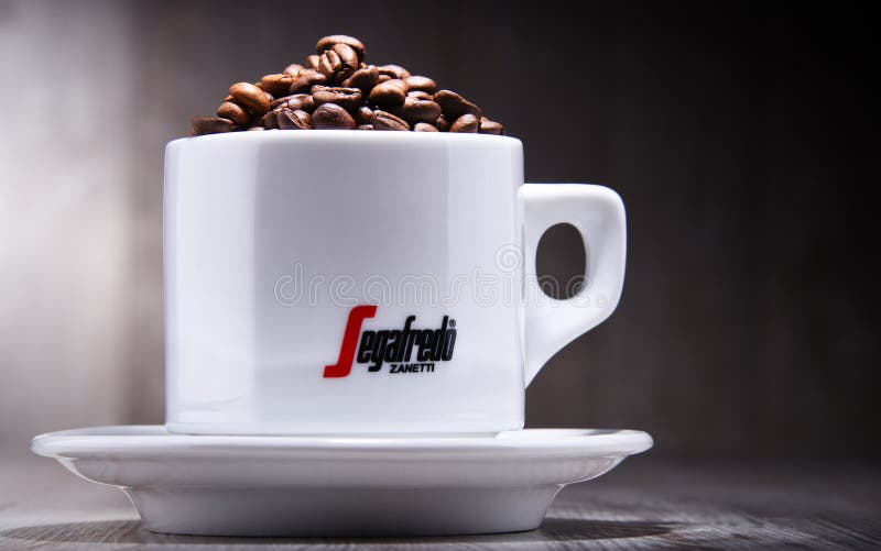 Composition with cup and beans of Segafredo Zanetti coffee