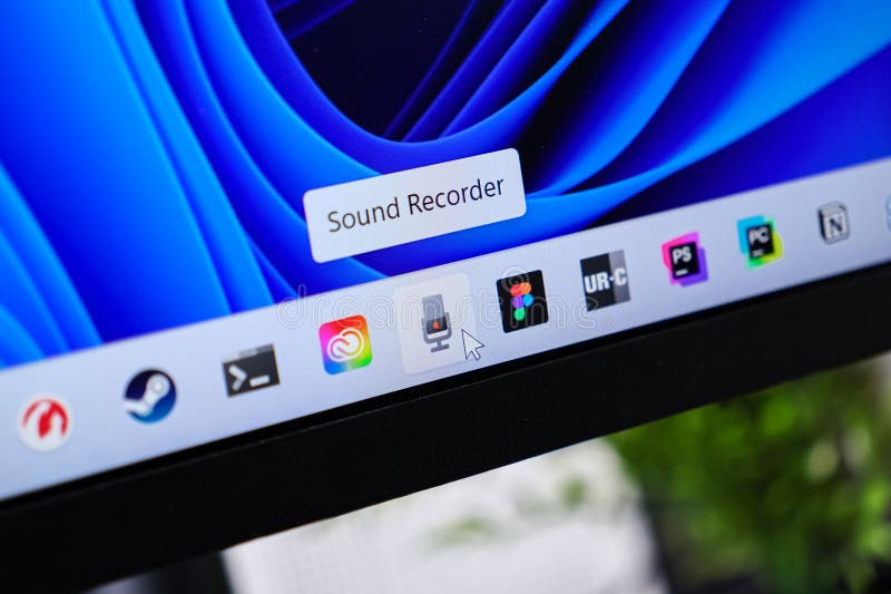 Poznan, Poland - June 6, 2025: Sound Recorder application icon highlighted by a cursor on a laptop screen, showcasing digital stock image