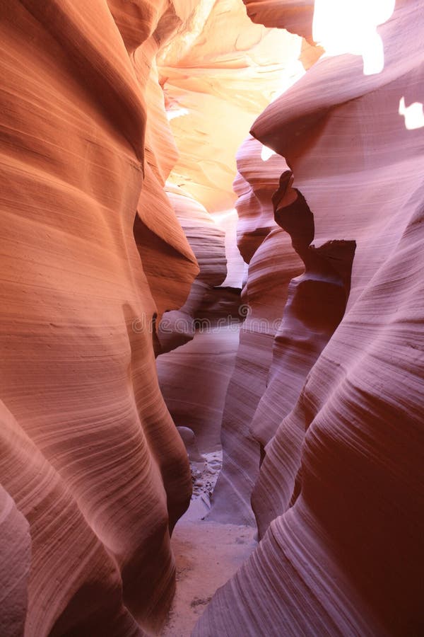 Narrow pathway through the south Antelope Canyons, which are made of red sands and strange shapes. Narrow pathway through the south Antelope Canyons, which are made of red sands and strange shapes