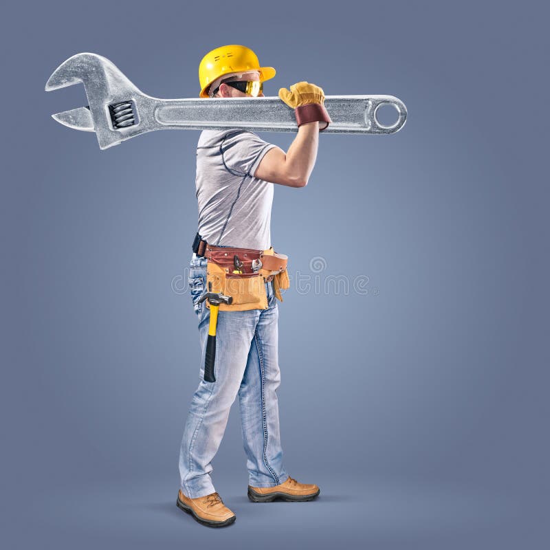 Construction worker with a tool belt and a wrench on a blue background. Construction worker with a tool belt and a wrench on a blue background