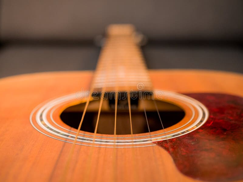 Practice Playing the Acoustic Guitar. Hands Playing Guitar and Picking Chords Stock Photo