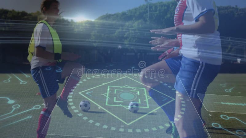 Practicing on field, soccer players with animation digital data overlay visible stock video