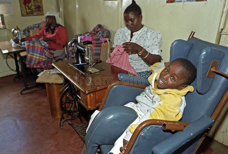 Pracująca Kenijska kobieta, niepełnosprawne dziecko, Nairobia