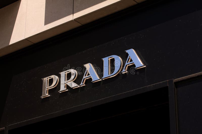 Prada Logo on Front Store in Shopping Street. Prada is a World Famous ...