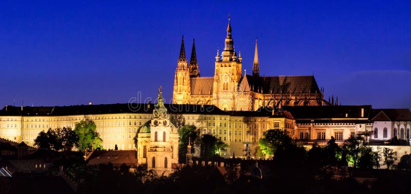 Prague, Czech Republic. Charles Bridge and Hradcany with St. Vitus Cathedral and St. George church evening dusk, Bohemia