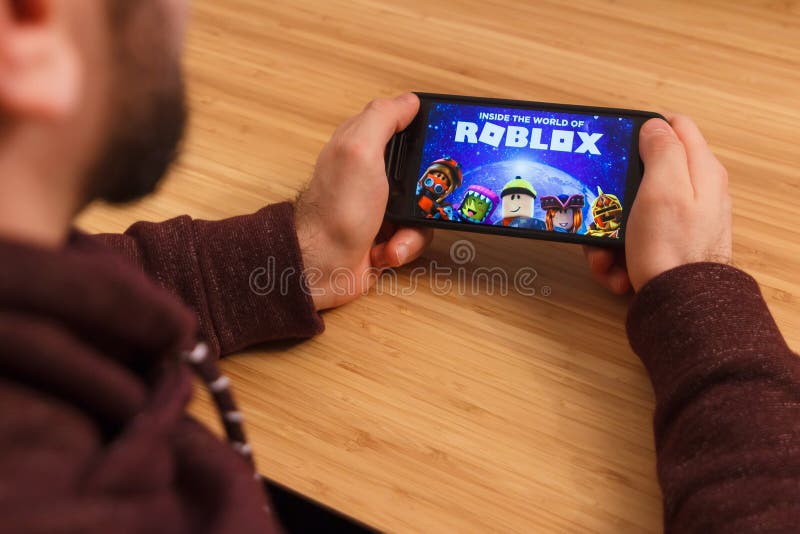 Roblox is an Online Game Platform and Game Creation System. it Allows Users  To Program Games and Play Games Created by Other Users Editorial Stock  Image - Image of background, cellphone: 214559929