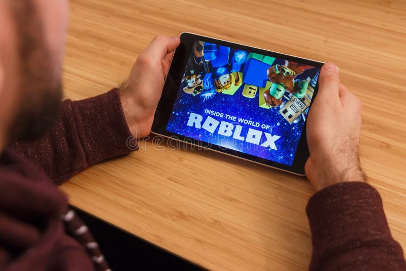 Roblox is an Online Game Platform and Game Creation System. it Allows Users  To Program Games and Play Games Created by Other Users Editorial Stock  Image - Image of background, cellphone: 214559929