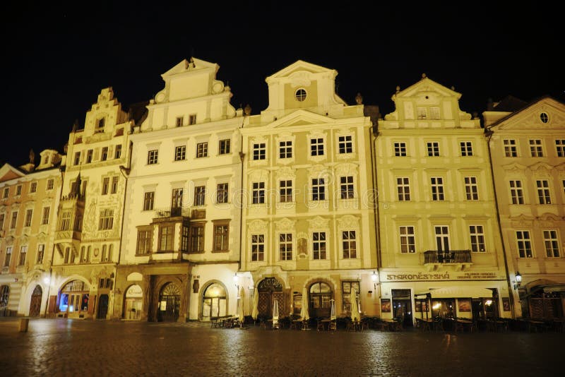 Old houses on Prague`s Old Town Square. City landscape. The dim lights of the evening