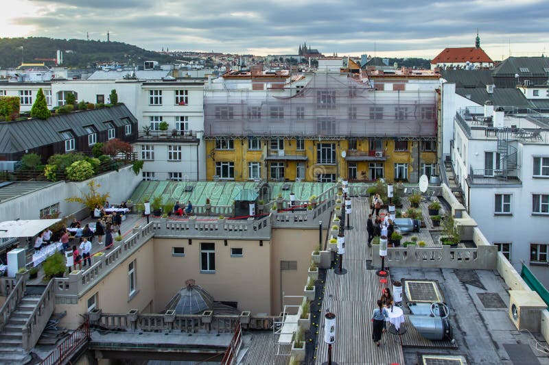 Prague, Czech Republic - September 10, 2020. Party people having fun in the open air on the roof of the Lucerna Palace. Unique