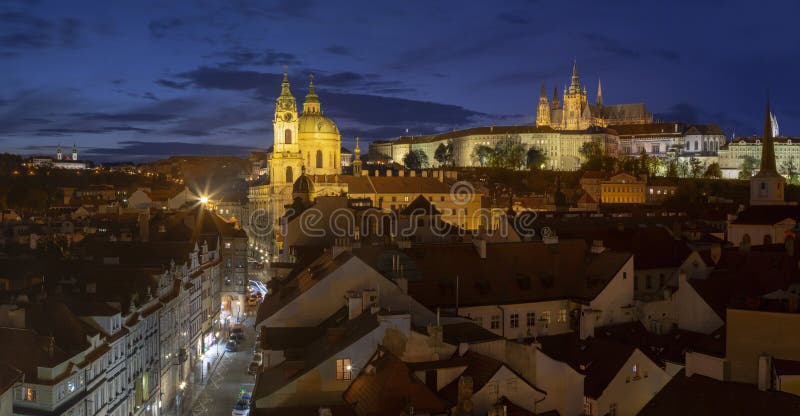 Prague - Czech Republic - The St. Nicholas church, Mala strana, Castle and Cathedral at dusk. Prague - Czech Republic - The St. Nicholas church, Mala strana, Castle and Cathedral at dusk