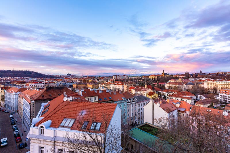 Prague panorama from Vysehrad castle. Cityscape during the sunset, magical and beautiful colors. Colorful clouds above the czech royalty free stock photos Prague panorama from Vysehrad castle. Cityscape during the sunset, magical and beautiful colors. Colorful clouds above the czech royalty free stock photos