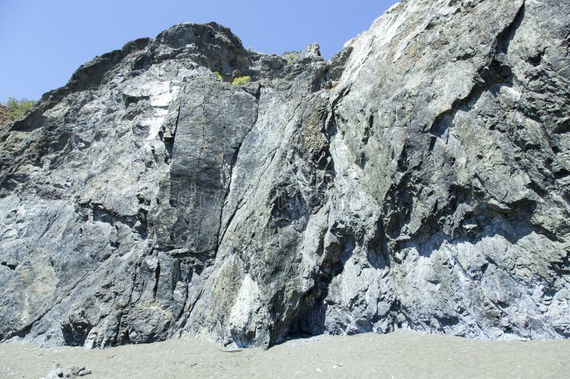 Praia Americana Areia Cinzenta e Rochas imagens de stock royalty free