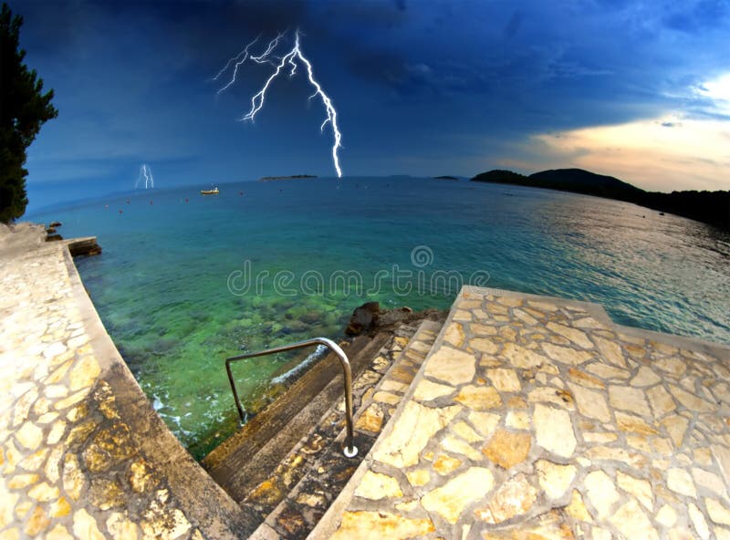 Beach and clear sea in Croatia Dalmatia, storm and thunderstorm. Beach and clear sea in Croatia Dalmatia, storm and thunderstorm