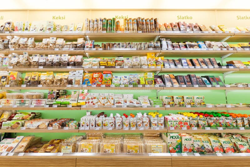 Packs of biscuits and chocolate in the shelves of shelves of a shopping center in Zagreb in Croatia. Packs of biscuits and chocolate in the shelves of shelves of a shopping center in Zagreb in Croatia.