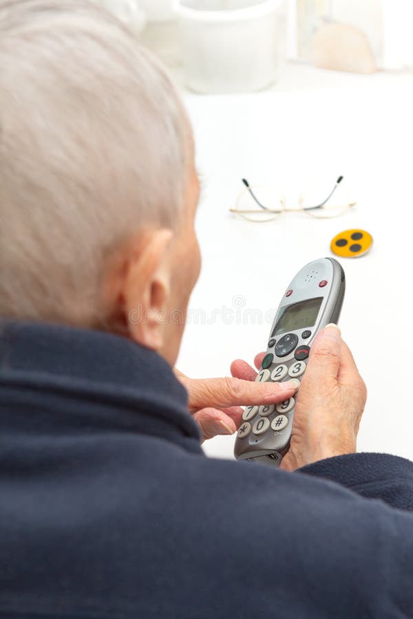 Prawie niewidomej osoby telefonu wielcy guziki zdjęcia stock Prawie niewidomej osoby telefonu wielcy guziki zdjęcia stock
