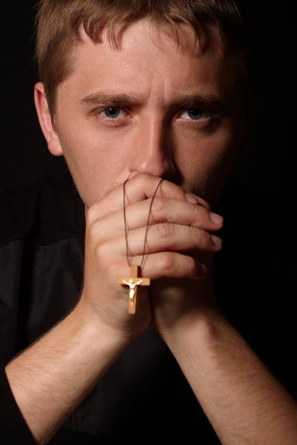 Young Man Praying in Church Stock Photo - Image of ceremony, belive ...