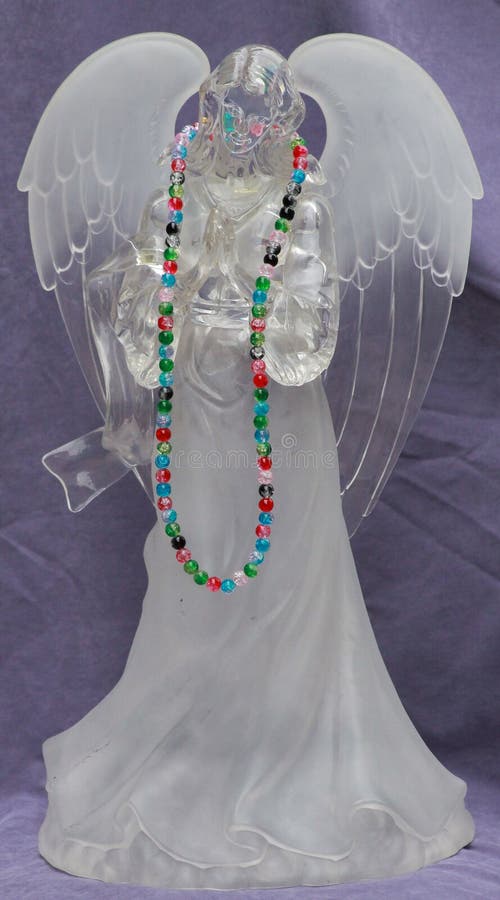 Prayer Angel with colorful beads royalty free stock photo Prayer Angel with colorful beads royalty free stock photo