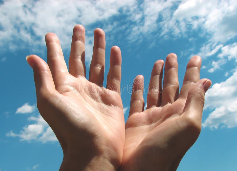Praying hands by the sky royalty free stock image Praying hands by the sky royalty free stock image
