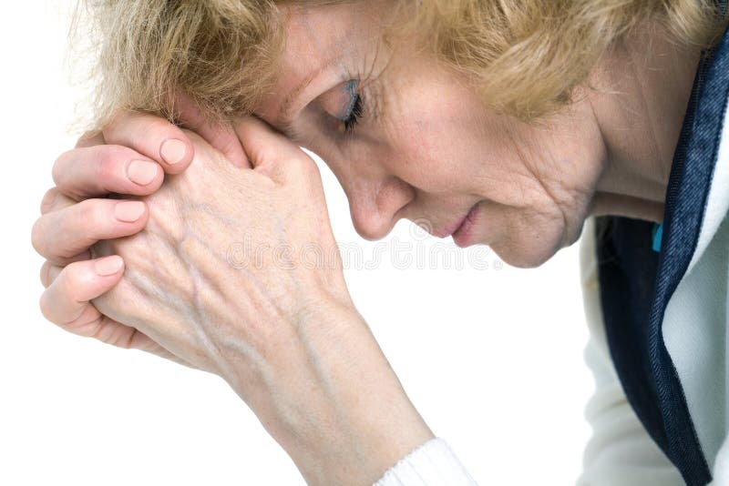 Praying senior woman stock photo Praying senior woman stock photo