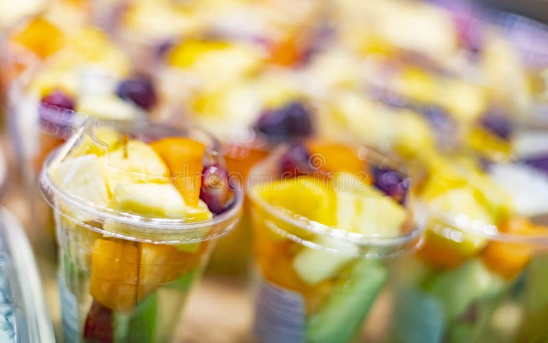 Prepackaged Fruit Salads Displayed in a Commercial Refrigerator Stock