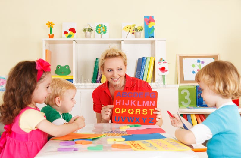 Pre-school children in the classroom with the teacher