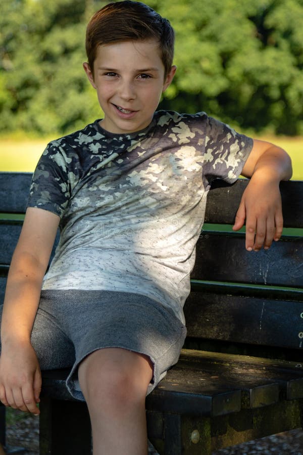 Sad Pre-teen Boy Sitting Outside Stock Photo - Image of years, outside ...