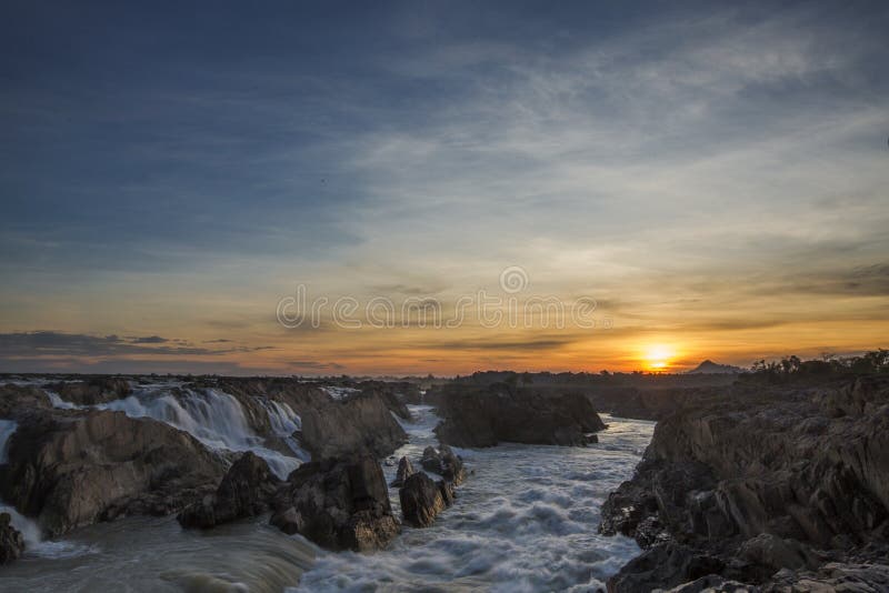 Preah nimth waterfalls in cambodia during sunrise royalty free stock photography Preah nimth waterfalls in cambodia during sunrise royalty free stock photography