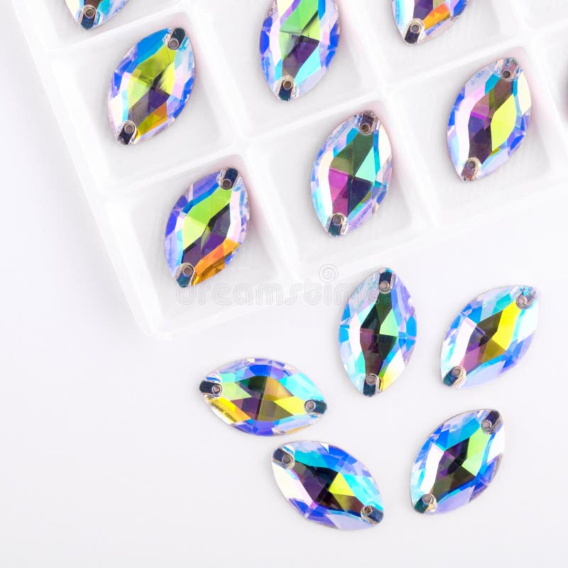 Precious stones crystal color in the pallet on a white background. royalty free stock photo