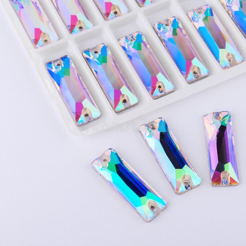 Precious stones crystal color in the pallet on a white background. royalty free stock images