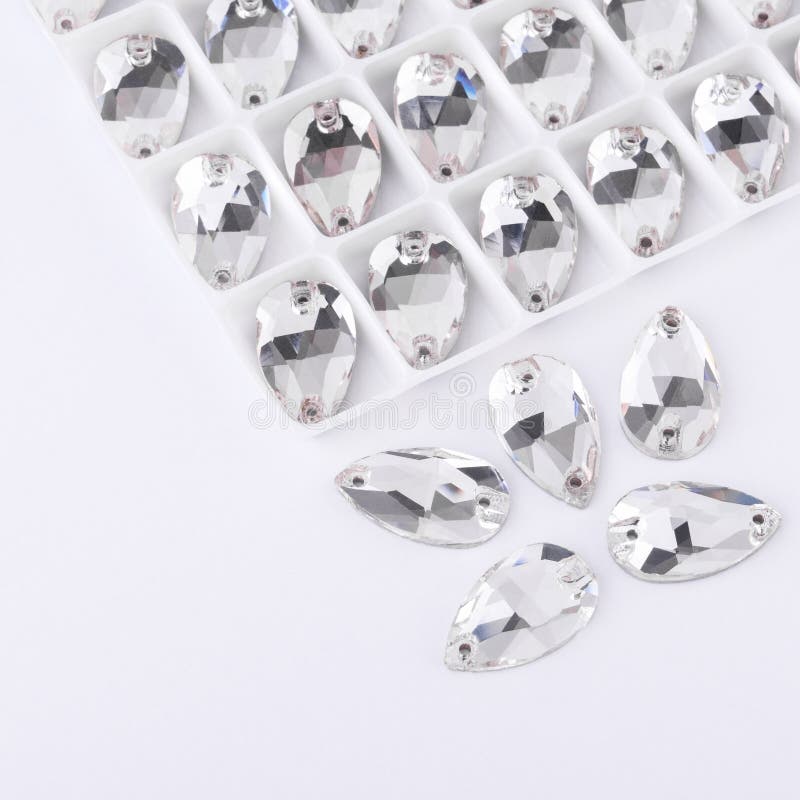 Precious stones crystal color in the pallet on a white background. stock photography