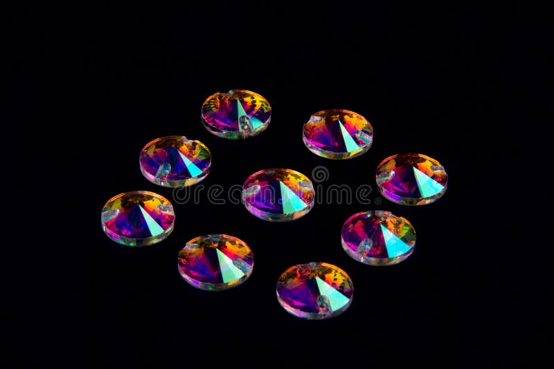 Precious stones crystals in the shape of a circle on a black background. royalty free stock image