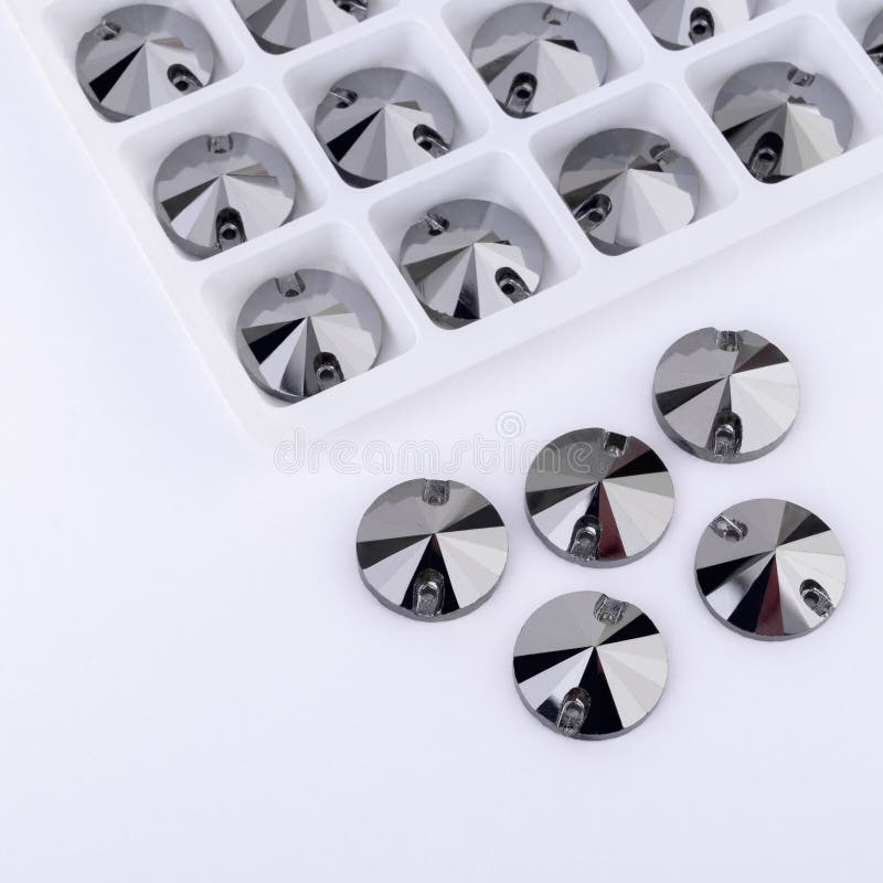 Precious stones graphite color in the pallet on a white background. royalty free stock image