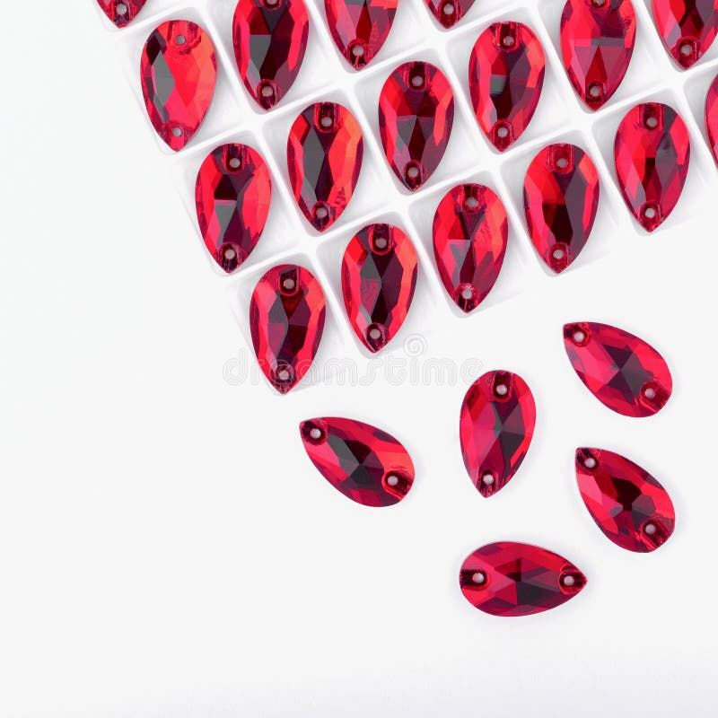 Precious stones red color in the pallet on a white background. stock images