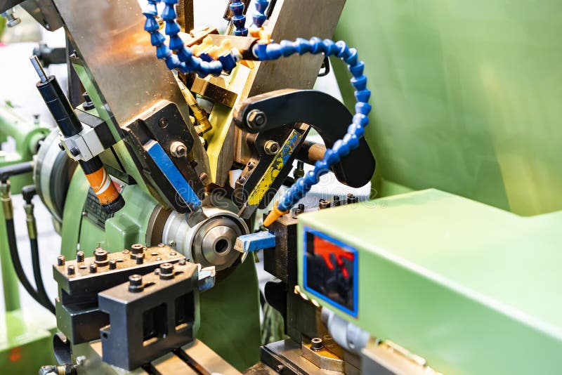 Precision automation turning forming lathe machine during in process production parts.