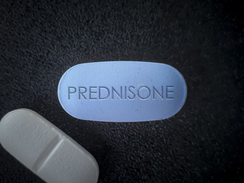 Prednisone tablet drug close up Glucocorticoid medication used to suppress the immune system in asthma, COPD, rheumatologic diseases. Prednisone tablet drug close up Glucocorticoid medication used to suppress the immune system in asthma, COPD, rheumatologic diseases