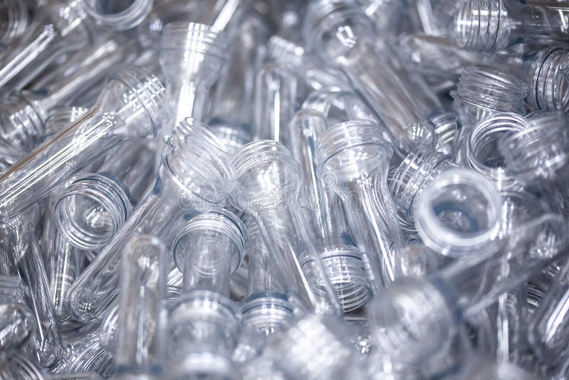 Preforms for Making PET Plastic Bottles. Raw Material Line Factory