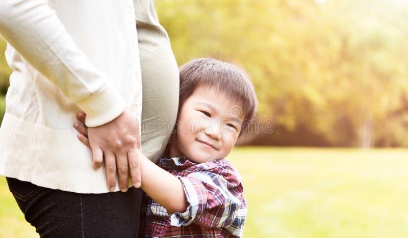 Pregnant Asian Mother And Her Son Stock Photo Image Of Parenthood