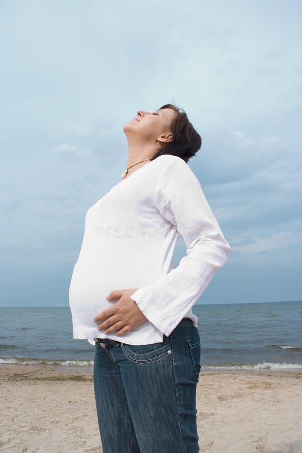 Pregnant on the beach