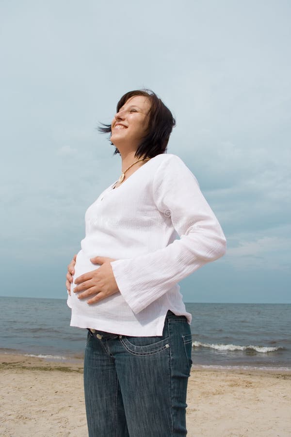 Pregnant on the beach