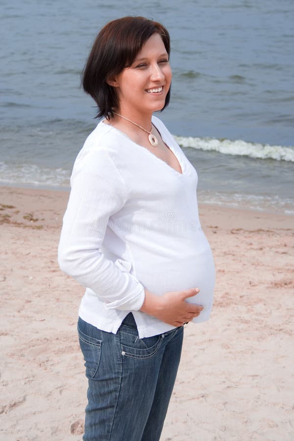 Pregnant on the beach