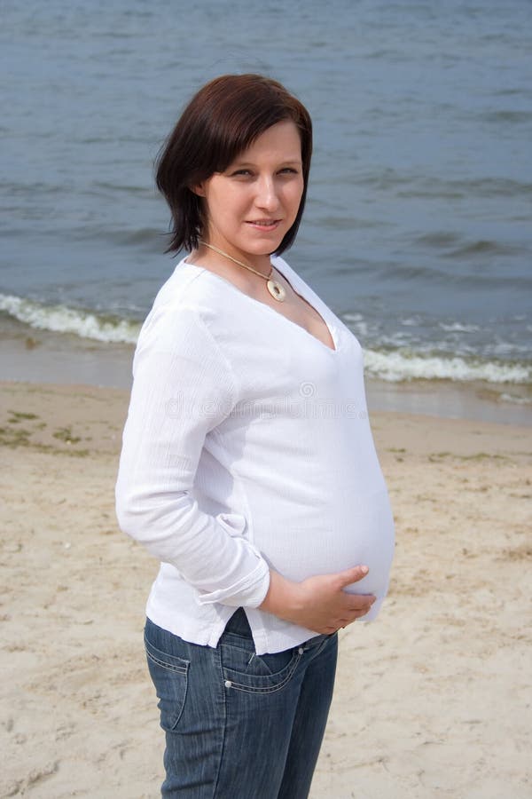 Pregnant on the beach