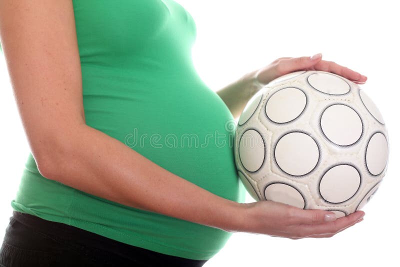Pregnant Belly and Football Ball Stock Photo - Image of hand, human ...