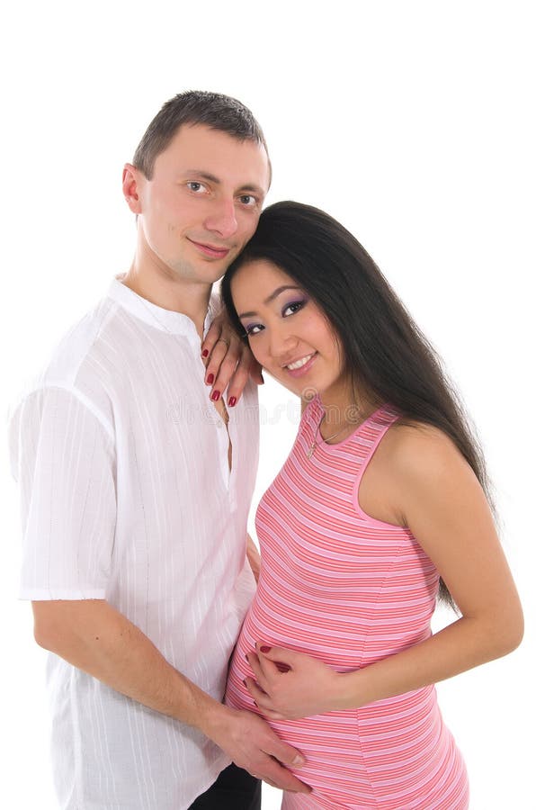 Pregnant couple Caucasoid father, mother asian